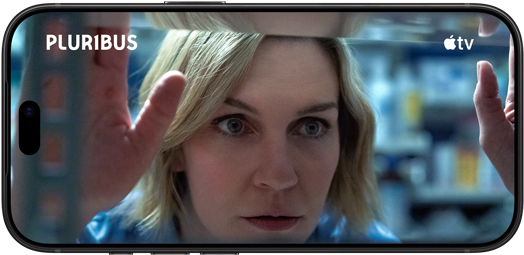 iPhone 18 Pro, landscape mode, displaying scene from series titled: Pluribus, Apple TV logo